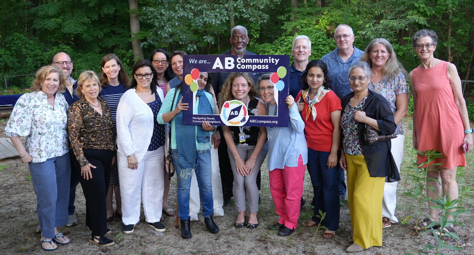 board and staff group picture outside